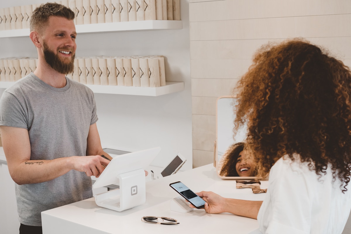 A customer using a card payment terminal